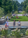 Guests look at the fountain in the Celebration Garden