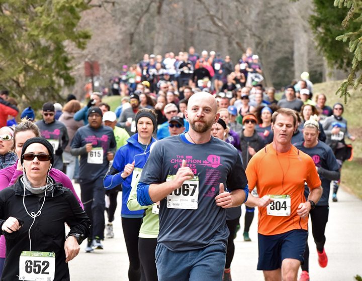 Guests running the Champion of Trees 10K race